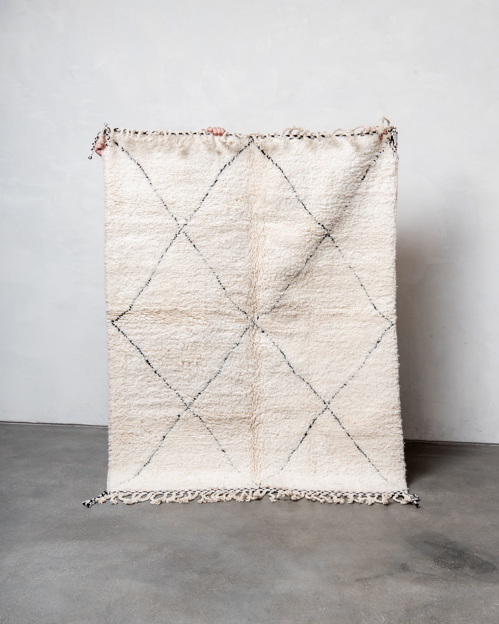 Modern, designer, handcrafted Berber rug from Morocco. Beniourain carpet with beautiful colours and patterns and fluffy wool texture.